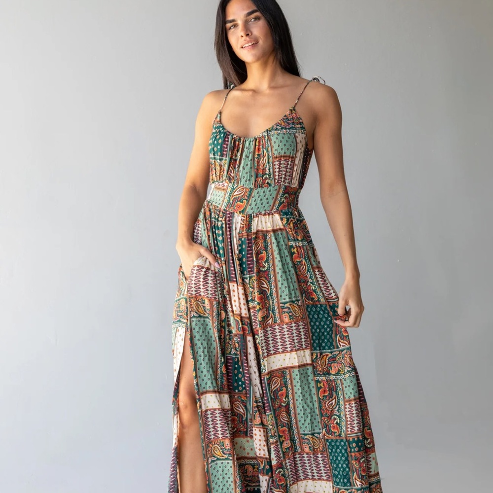 Beautiful jumpsuit from natural life.   Never worn.    Too large for me.